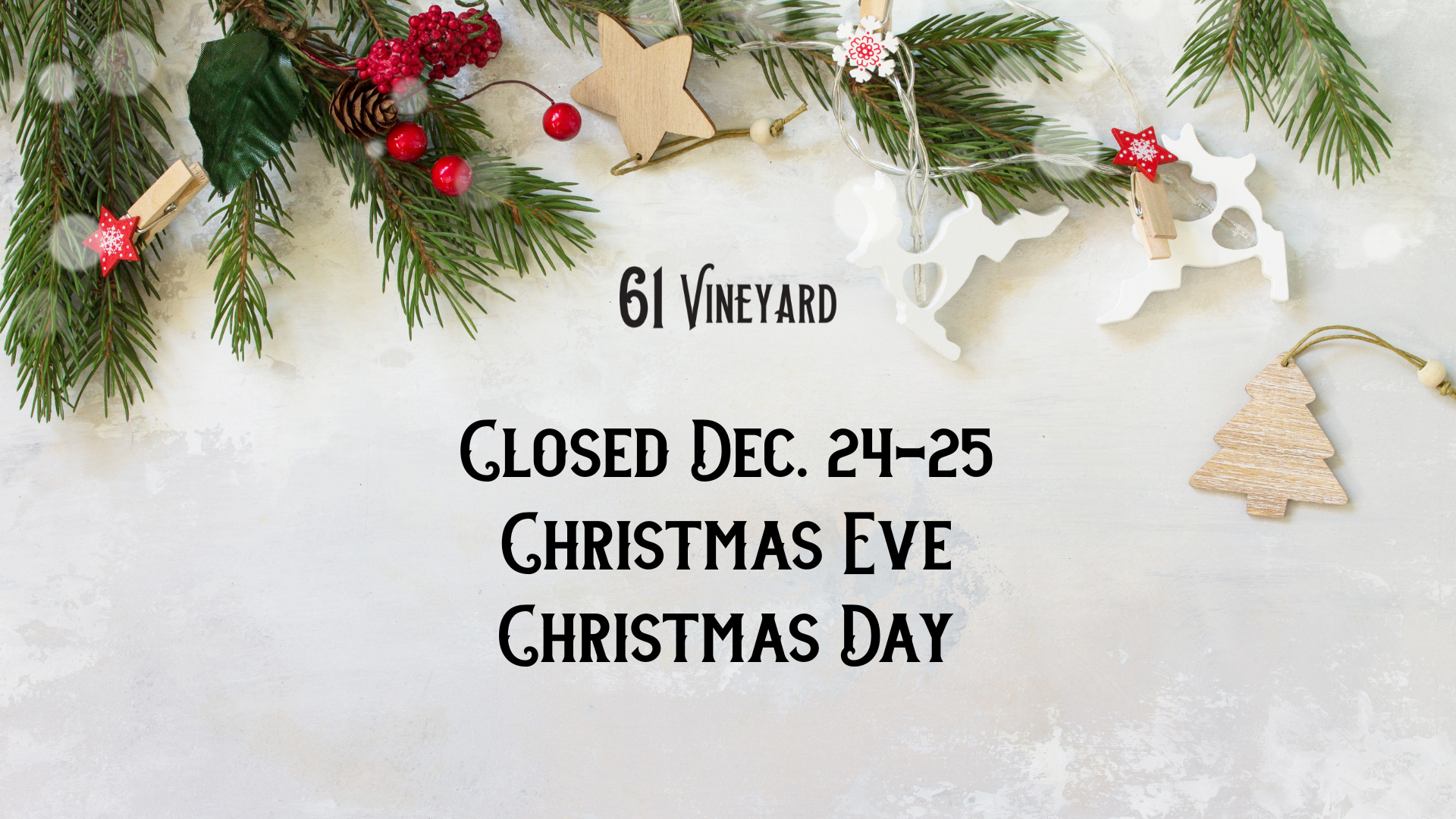 Christmas garland surrounds a message that reads 61 Vineyard is closed on Christmas Eve and Christmas Day.